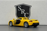 Porsche Carrera GT Yellow - Kinsmart 1:36 Diecast