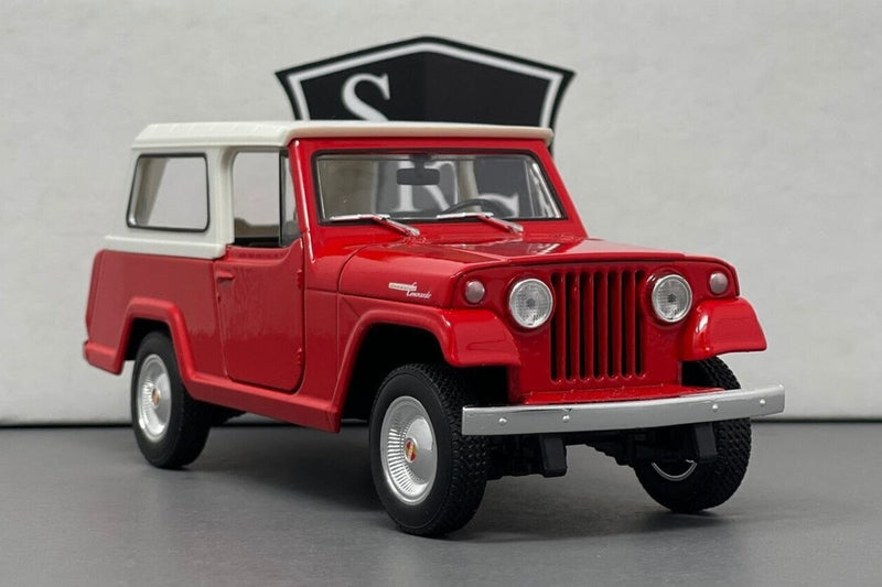 Jeep Jeepster Commando - Welly 1:24 Diecast