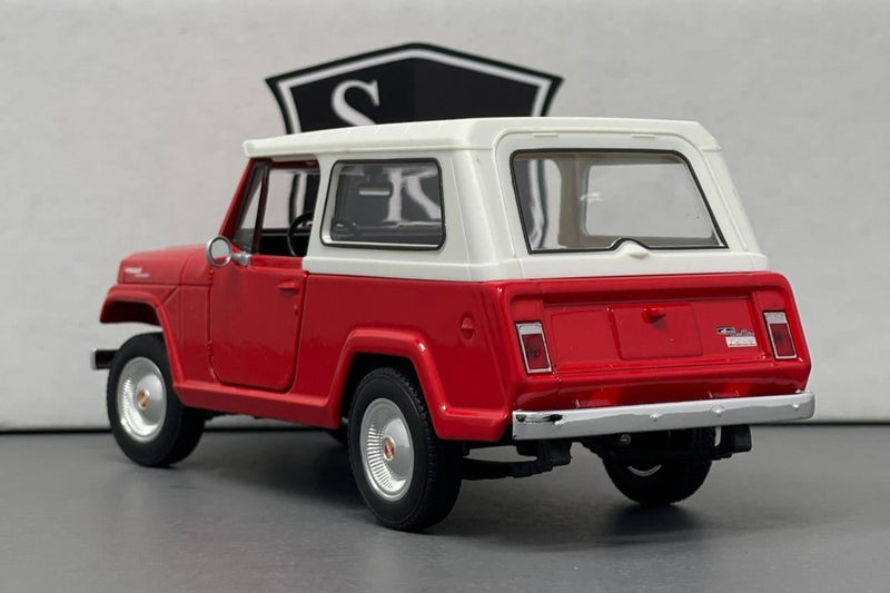 Jeep Jeepster Commando - Welly 1:24 Diecast