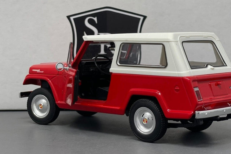 Jeep Jeepster Commando - Welly 1:24 Diecast